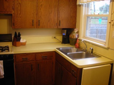 324 Beacon Place Munster, IN 46321 - Photo 8 of 10 a kitchen with a sink cabinets and window