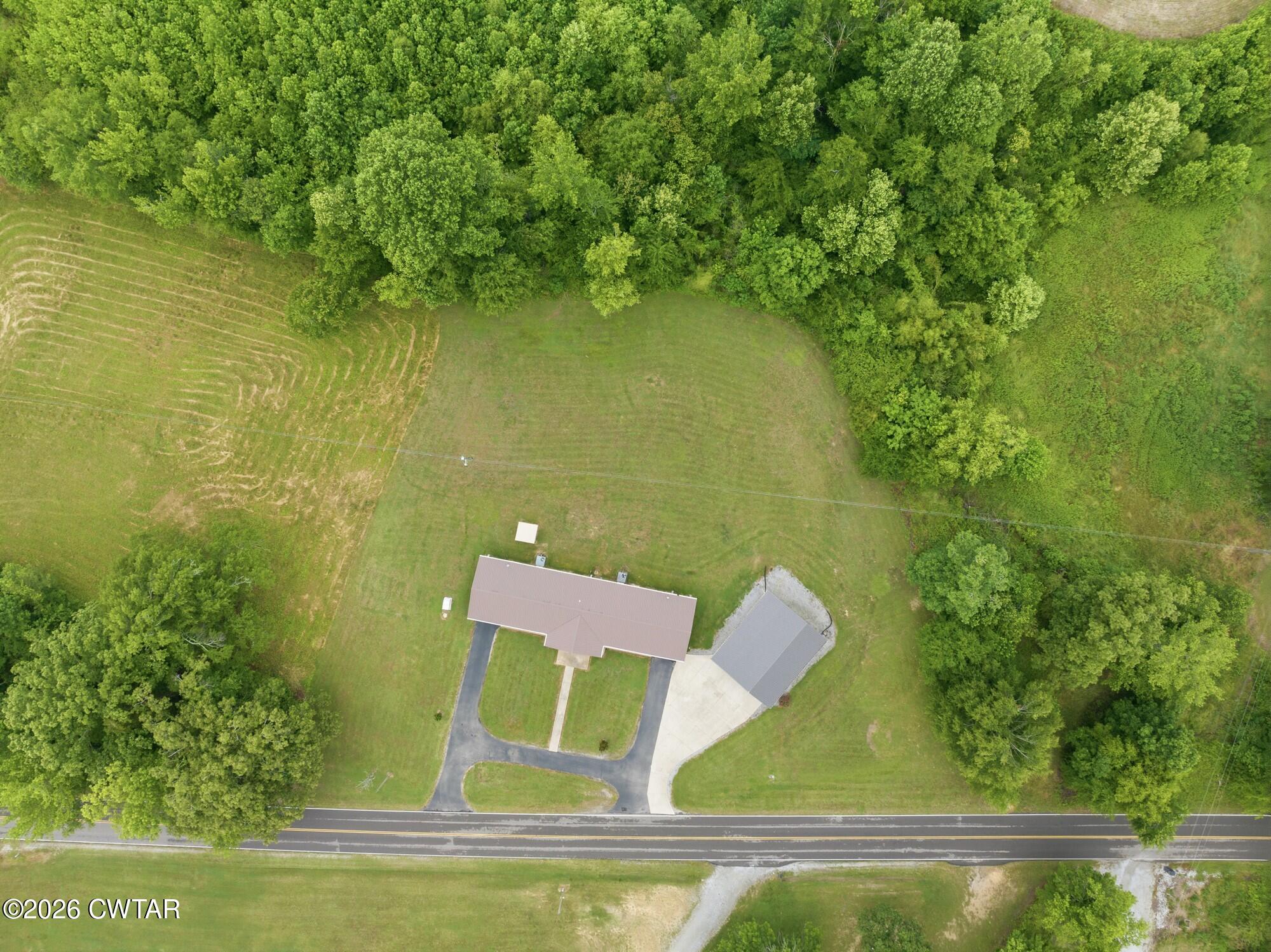 944 Brooksie Thompson Road Decaturville, TN 38329 - Photo 43 of 47 a view of a lake from a balcony