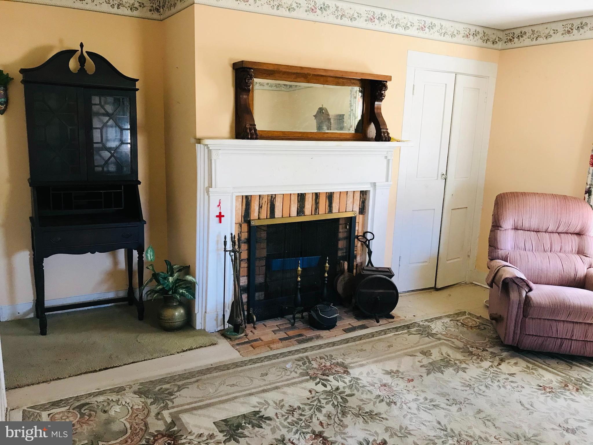 27591 Fairmount Road Westover, MD 21871 - Photo 3 of 23 15'x14' Living Room with Fireplace and Hardwoods