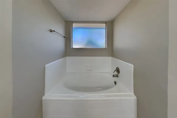 a bathroom with a bathtub