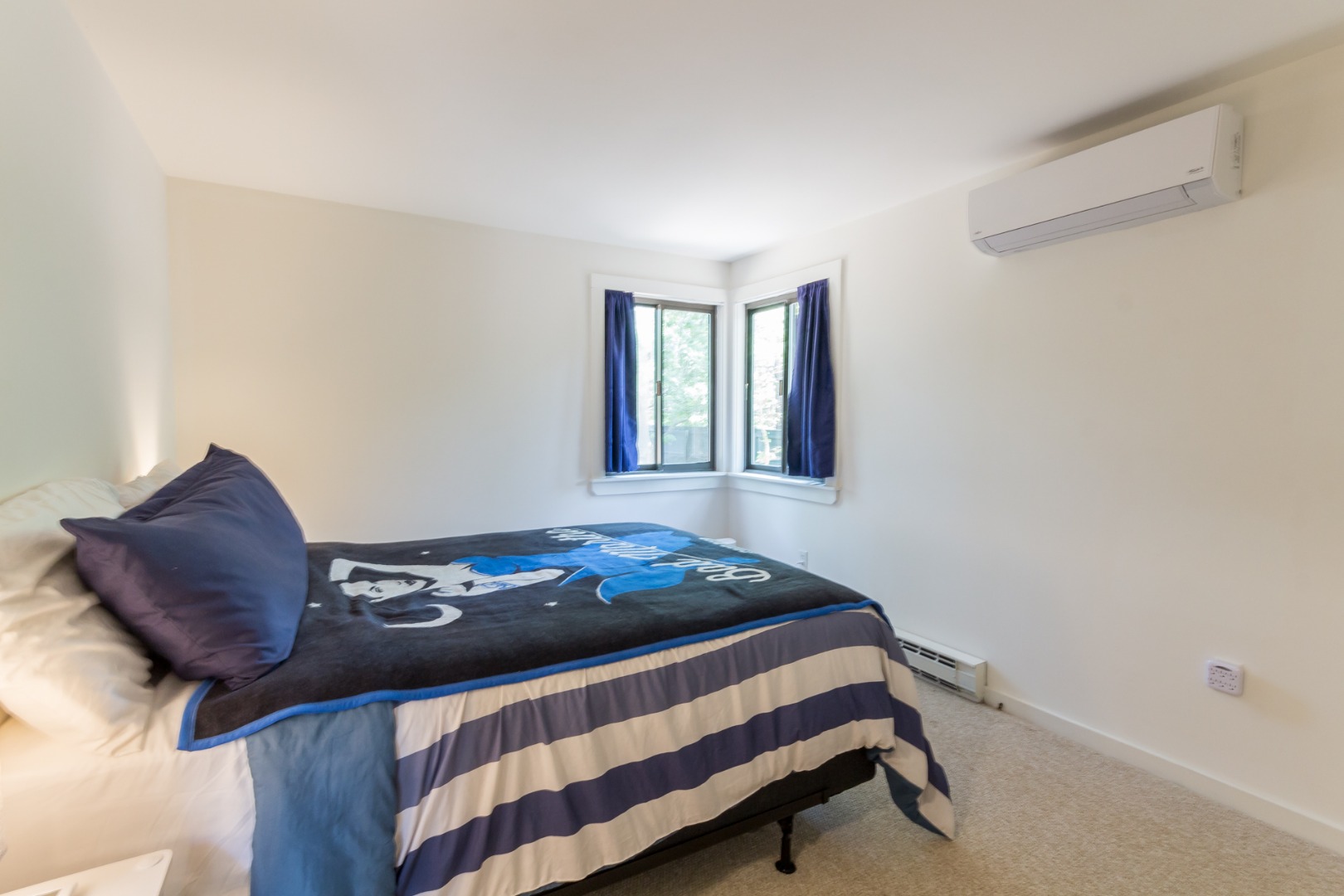 81 Marthas Road Edgartown, MA 02539 - Photo 15 of 23 a bedroom with a bed and a window