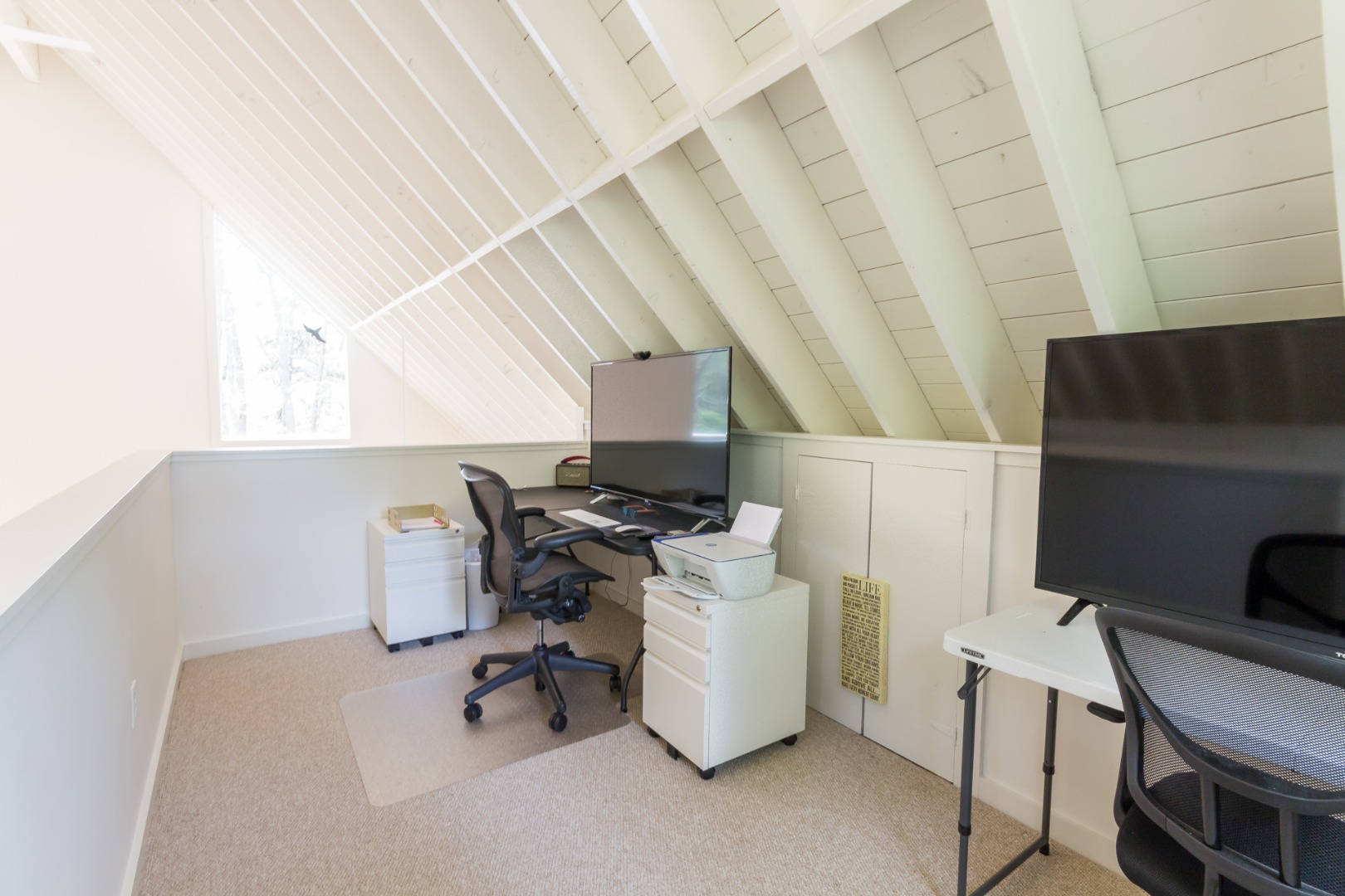 81 Marthas Road Edgartown, MA 02539 - Photo 18 of 23 a workspace with furniture and a fireplace