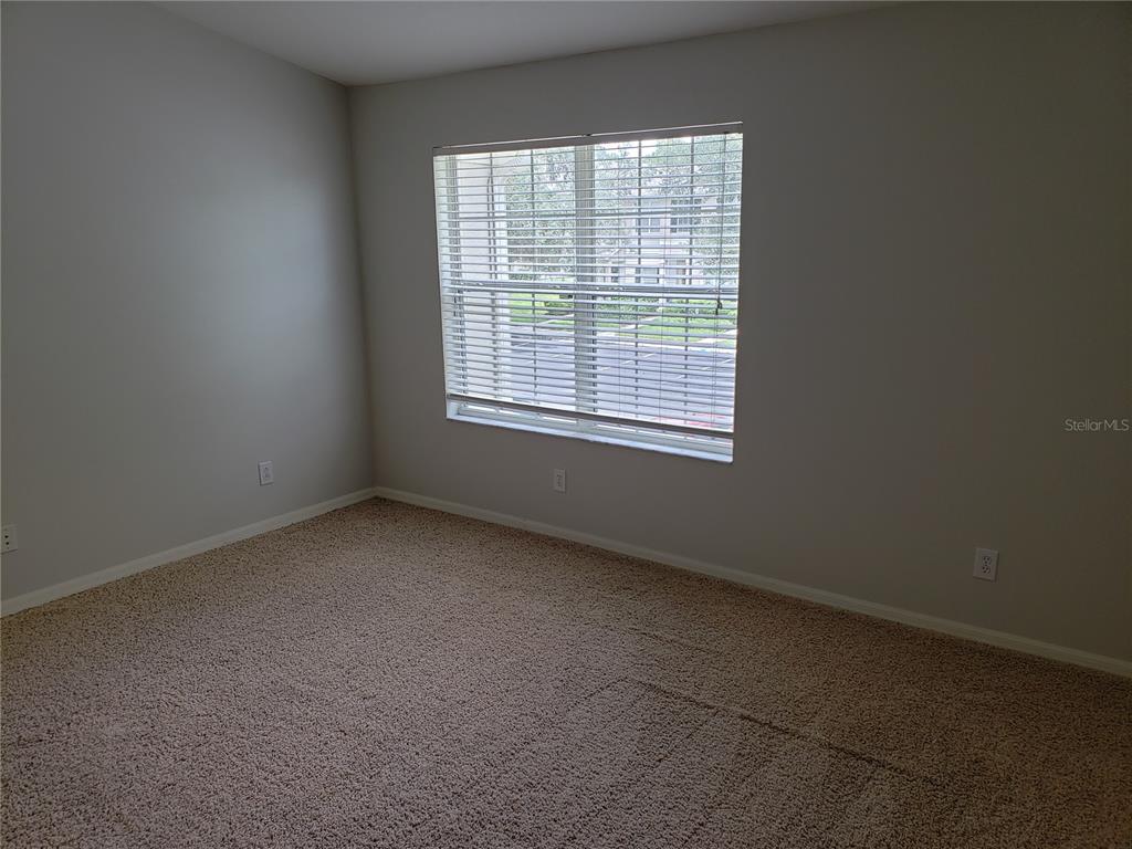 5870 Fishhawk Ridge Drive Lithia, FL 33547 - Photo 18 of 34 an empty room with a window