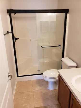 a view of a room that has a window in it
