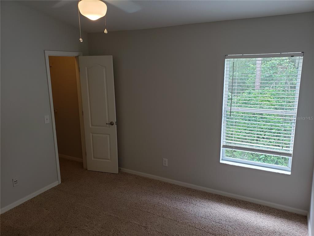 5870 Fishhawk Ridge Drive Lithia, FL 33547 - Photo 21 of 34 a view of a room that has a window in it