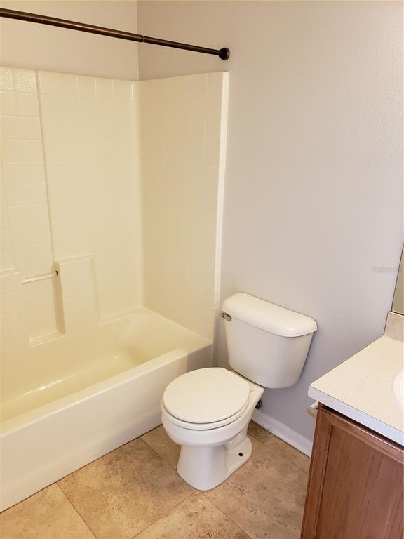 5870 Fishhawk Ridge Drive Lithia, FL 33547 - Photo 22 of 34 a white toilet sitting next to a bath tub