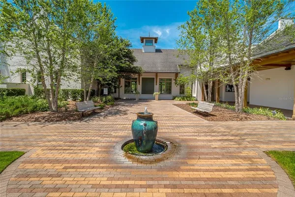 a view of a porch with wooden floor and outdoor space