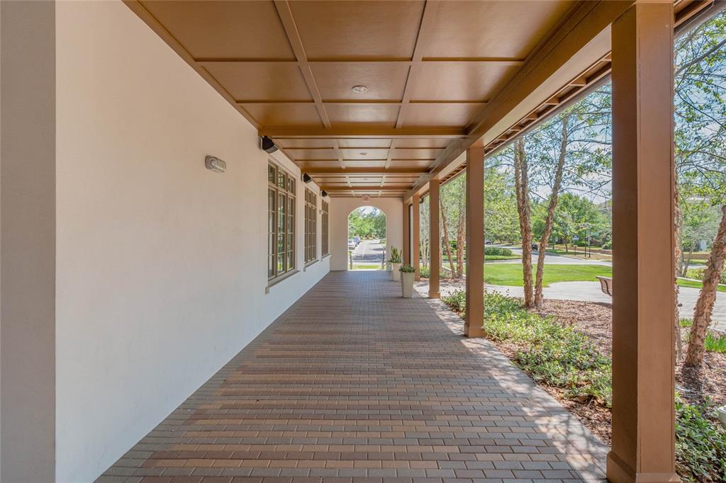 5870 Fishhawk Ridge Drive Lithia, FL 33547 - Photo 28 of 34 a view of a porch with wooden floor and outdoor space