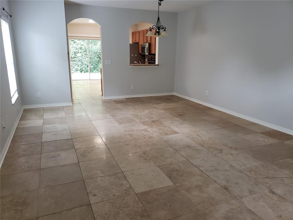 5870 Fishhawk Ridge Drive Lithia, FL 33547 - Photo 5 of 34 a room that has a window in it