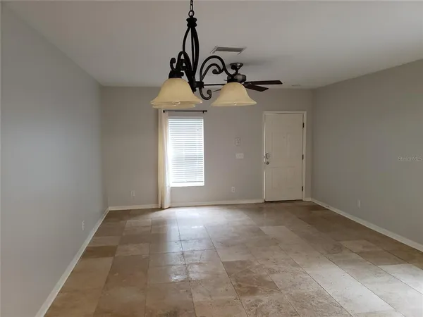 a view of a storage & utility room in back yard