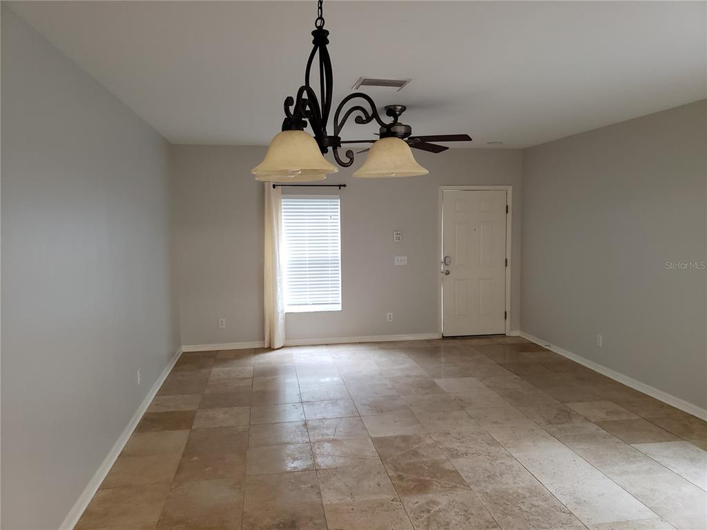 5870 Fishhawk Ridge Drive Lithia, FL 33547 - Photo 8 of 34 a view of a storage & utility room in back yard