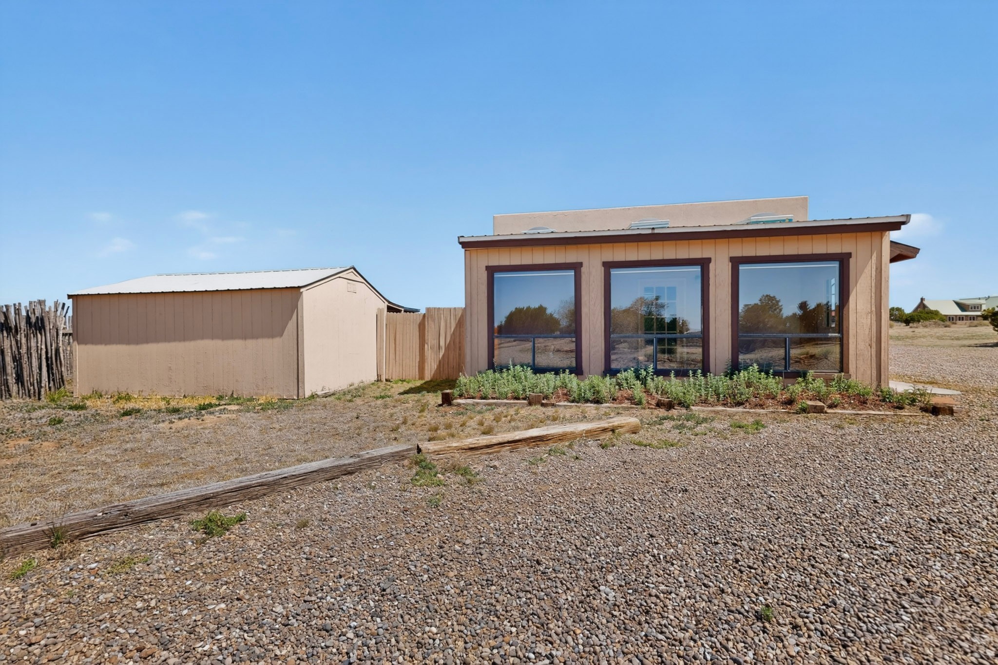10 Blue Mesa Road Santa Fe, NM 87508 - Photo 43 of 63 Sunroom off the 2 car garage/workshop