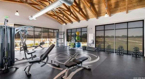 a view of a gym with large windows