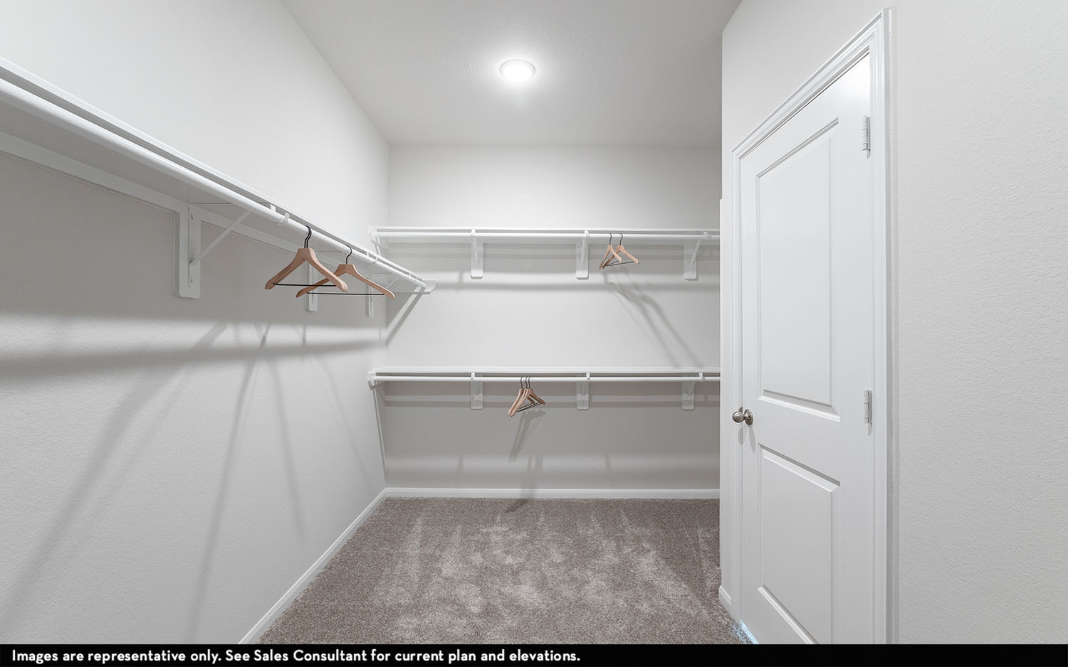 25612 Becky Bourn Lane Elgin, TX 78621 - Photo 14 of 20 a view of walk in closet with racks