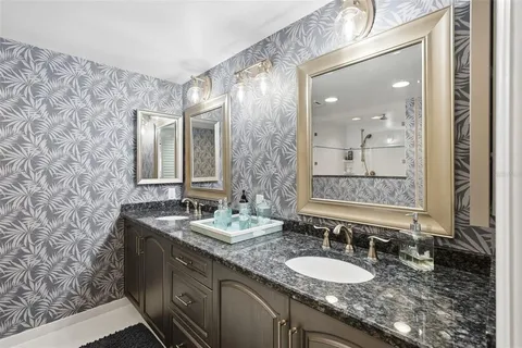 a bathroom with a shower and a shower