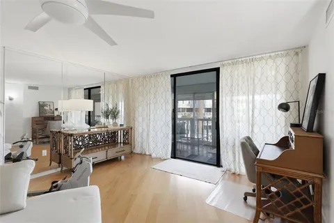 a view of swimming pool from a balcony