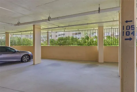 a room with gym equipment and a table