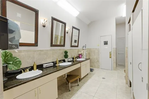 a view of a swimming pool with a lounge chair