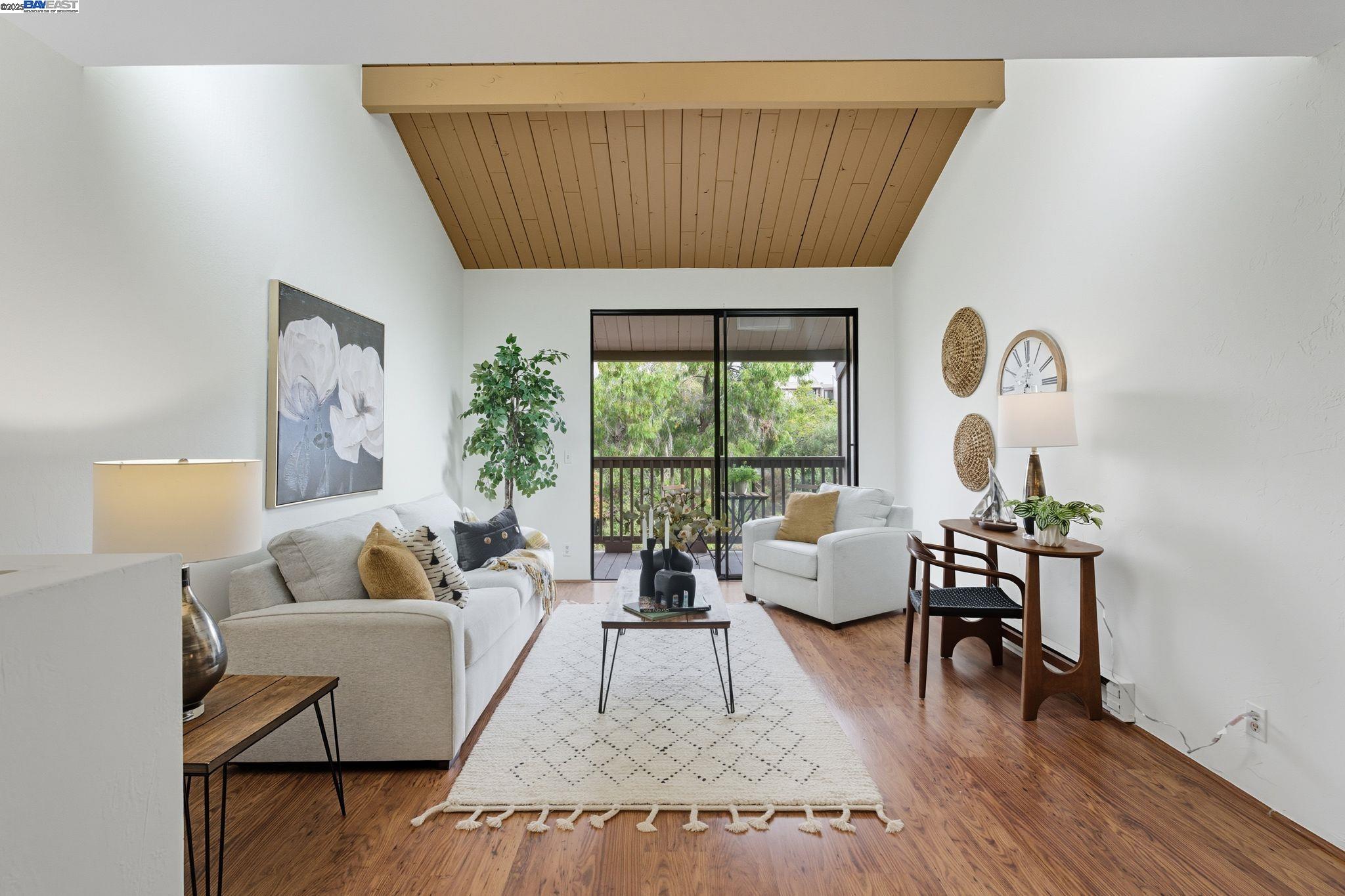 2101 Shore Line Drive, Unit 233 Alameda, CA 94501 - Photo 19 of 47 a living room with furniture and a large window