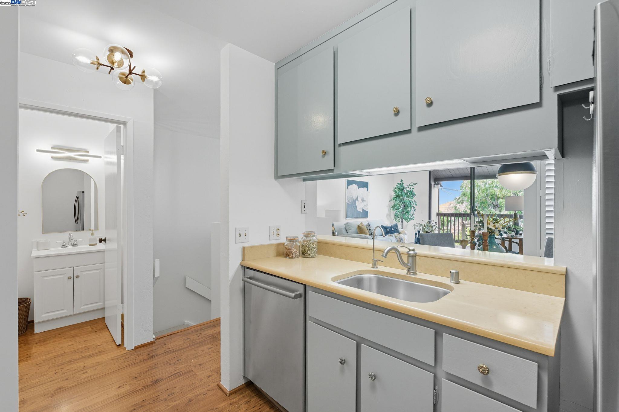 2101 Shore Line Drive, Unit 233 Alameda, CA 94501 - Photo 28 of 47 a kitchen with a sink cabinets and window