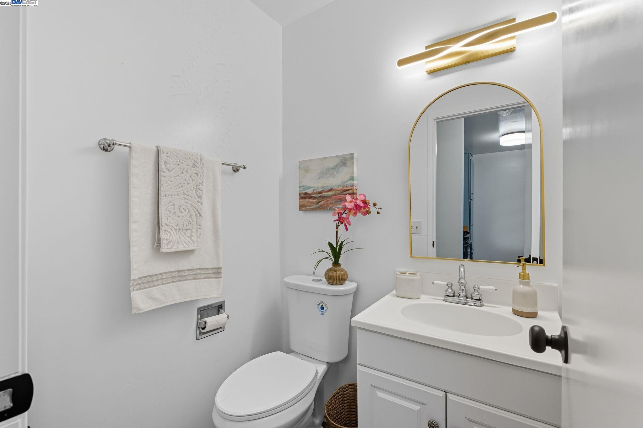 2101 Shore Line Drive, Unit 233 Alameda, CA 94501 - Photo 29 of 47 a bathroom with a sink mirror and toilet