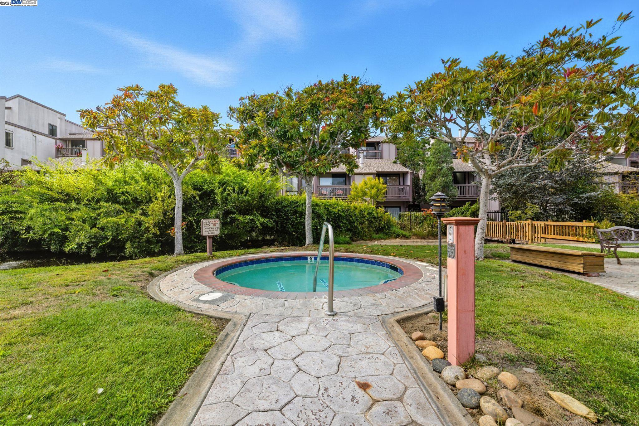 2101 Shore Line Drive, Unit 233 Alameda, CA 94501 - Photo 3 of 47 a view of a garden with a slide