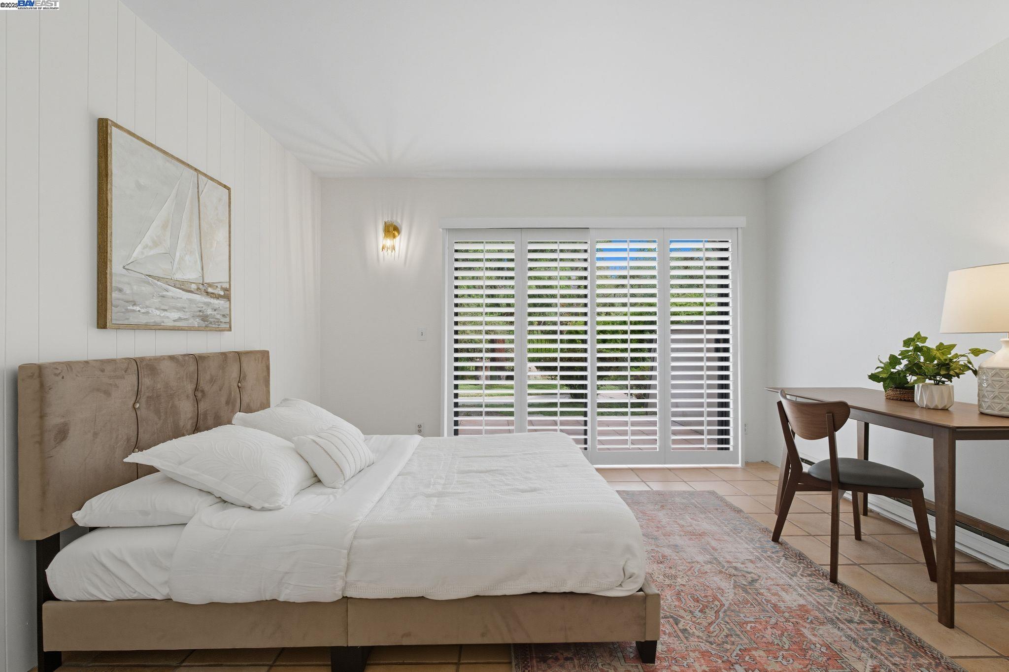 2101 Shore Line Drive, Unit 233 Alameda, CA 94501 - Photo 31 of 47 a bedroom with a bed and a table