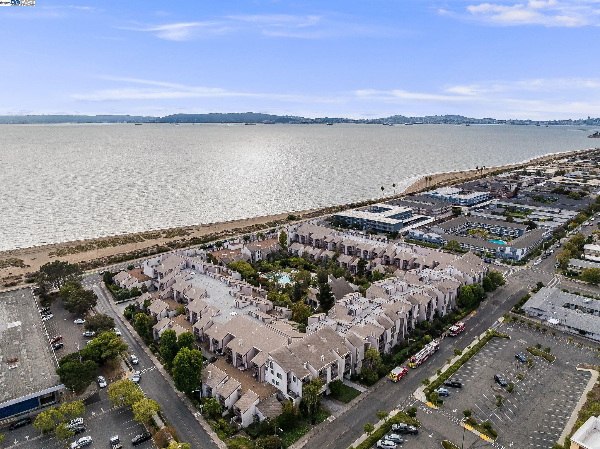 2101 Shore Line Drive, Unit 233 Alameda, CA 94501 - Photo 46 of 47 a view of a lake with a mountain