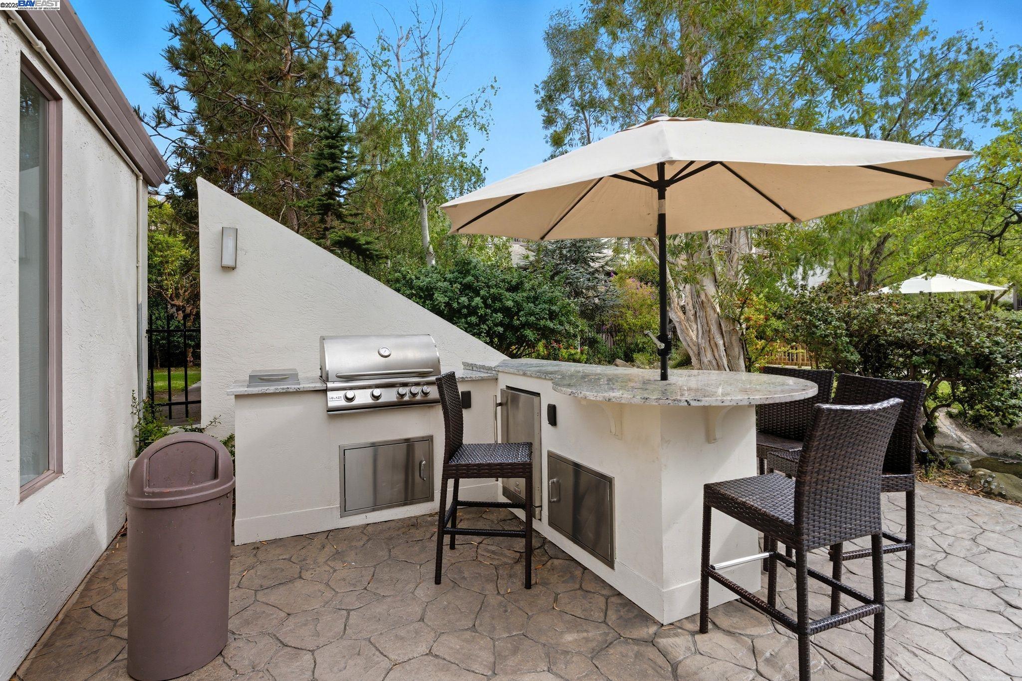 2101 Shore Line Drive, Unit 233 Alameda, CA 94501 - Photo 8 of 47 a patio with a patio table and chairs