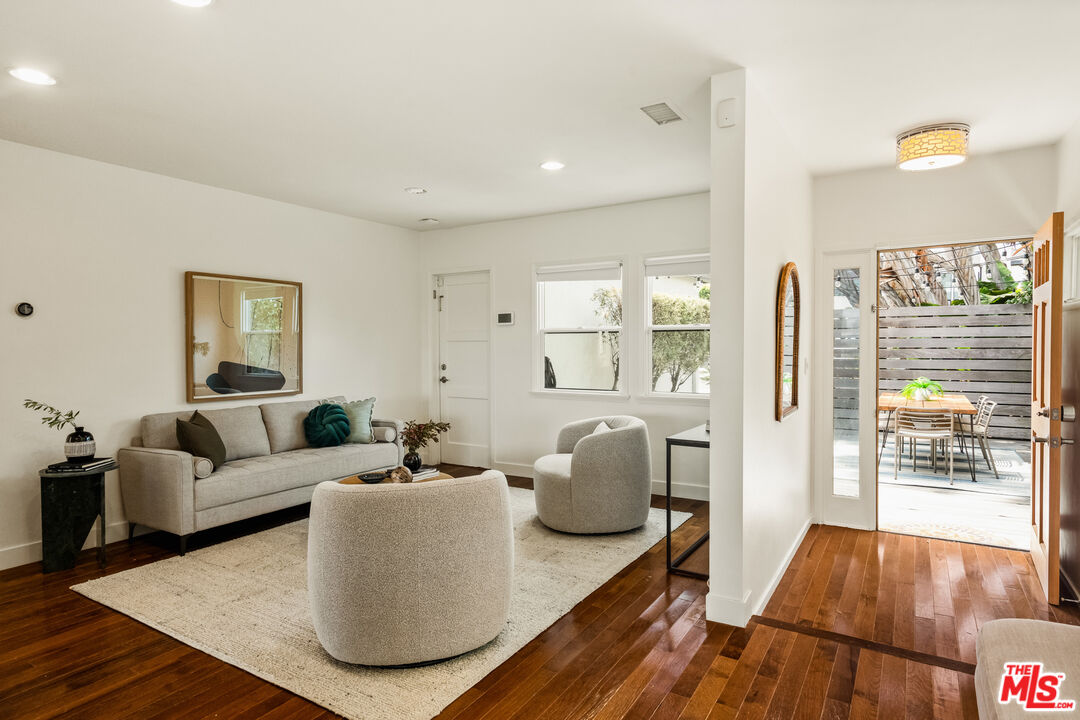 7406 Earldom Avenue Playa del Rey, CA 90293 - Photo 12 of 61 a living room with furniture and wooden floor