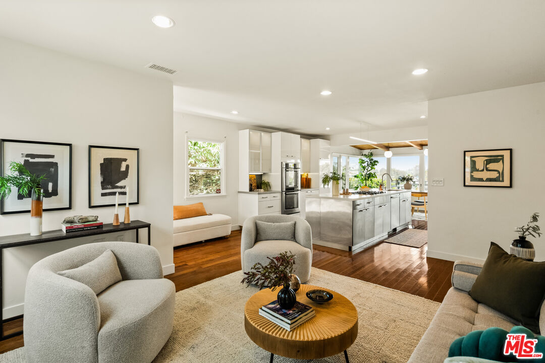 7406 Earldom Avenue Playa del Rey, CA 90293 - Photo 3 of 61 a living room with furniture and a view of kitchen