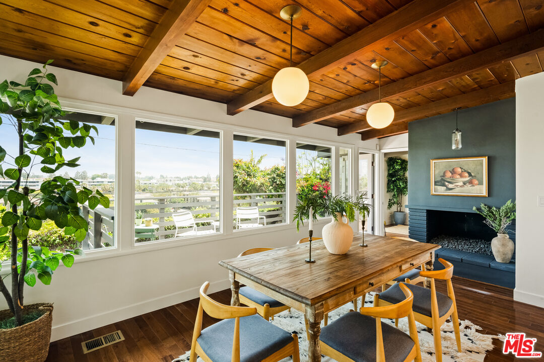 7406 Earldom Avenue Playa del Rey, CA 90293 - Photo 44 of 61 a view of a dining room with furniture window and outside view