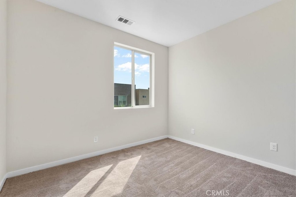 726 Central Avenue Upland, CA 91786 - Photo 16 of 42 an empty room with a window
