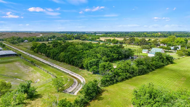 a view of a yard with swimming pool