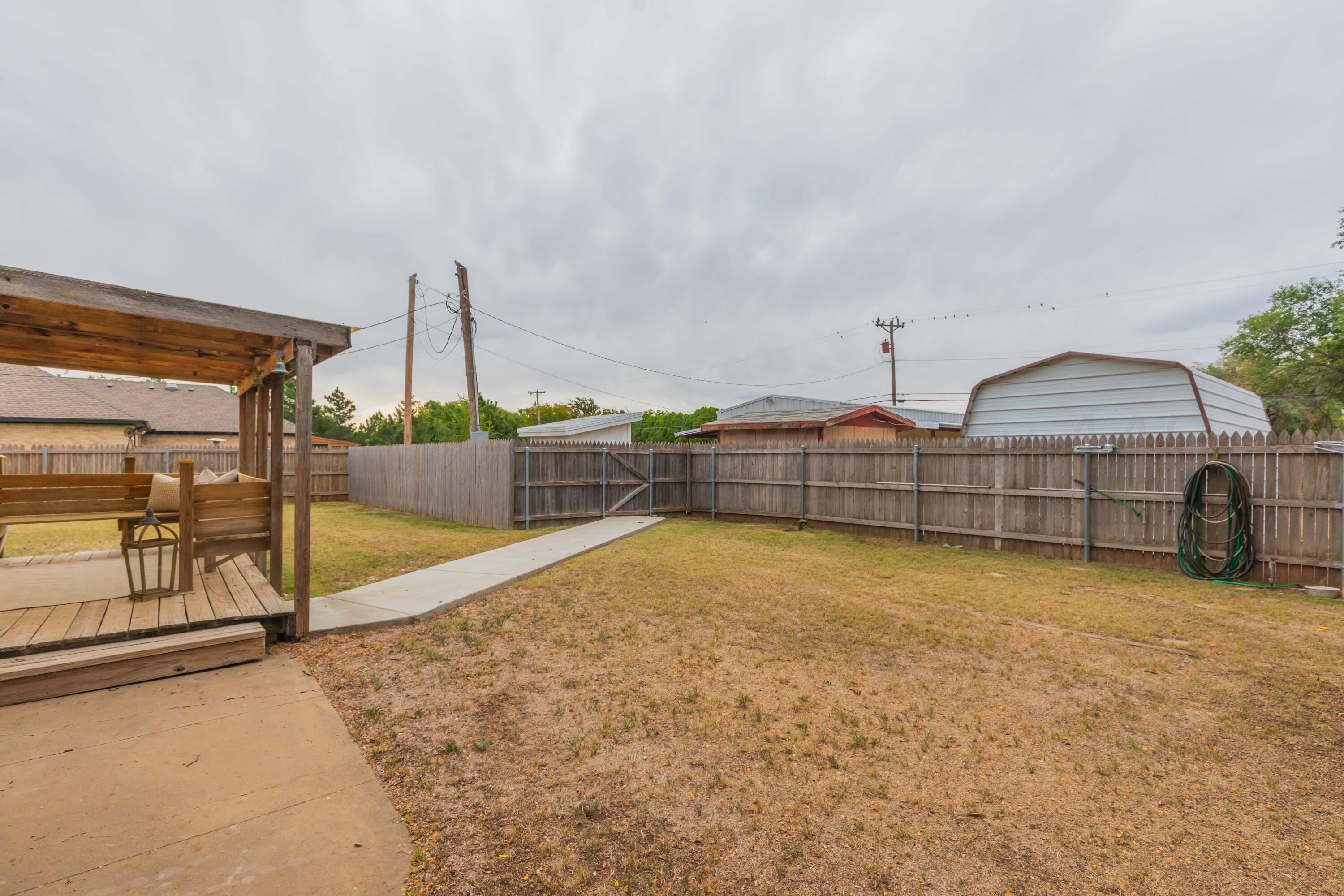 4221 Arden Road Amarillo, TX 79110 - Photo 37 of 50 a view of a house with swimming pool