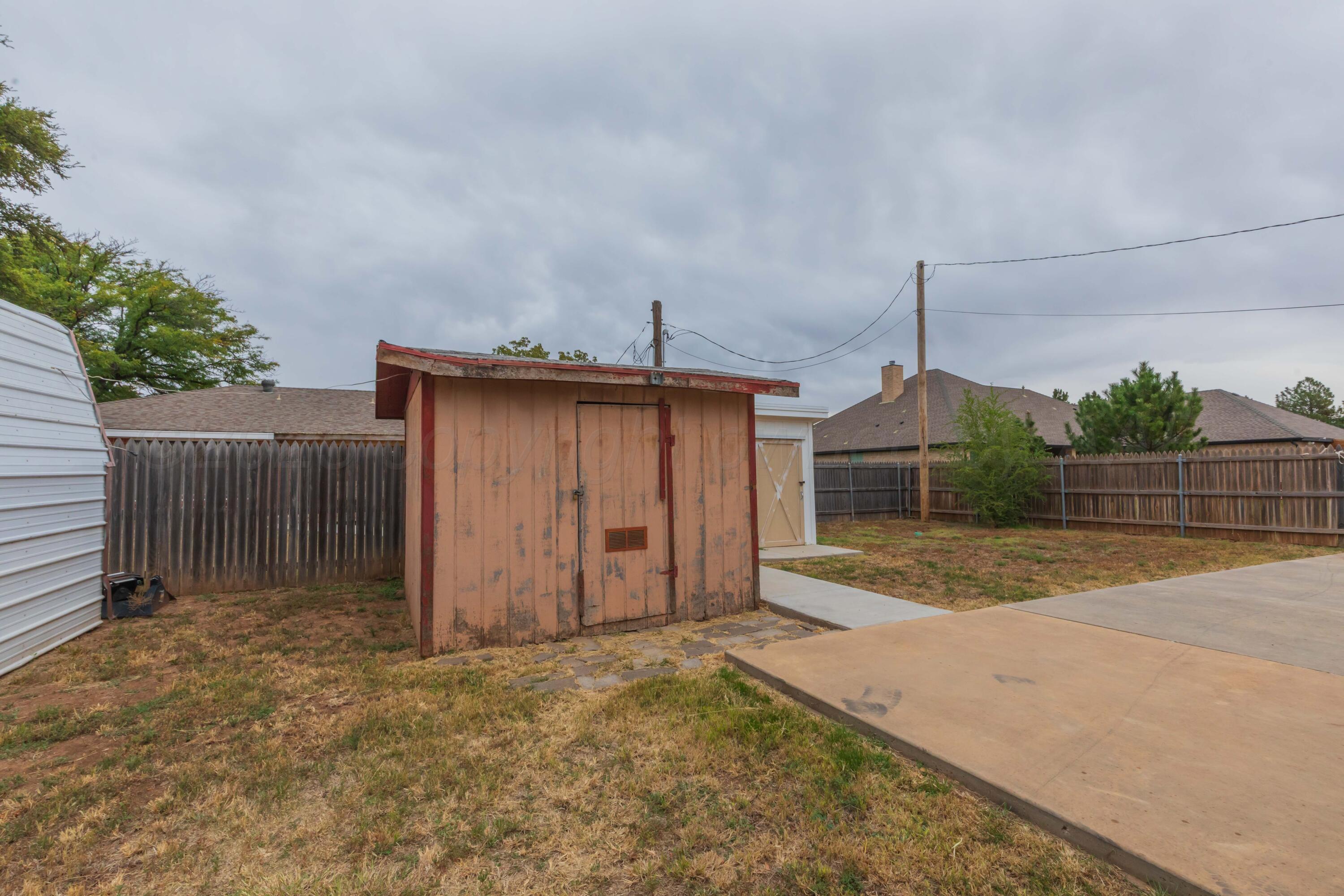 4221 Arden Road Amarillo, TX 79110 - Photo 45 of 50 a view of a house with a backyard