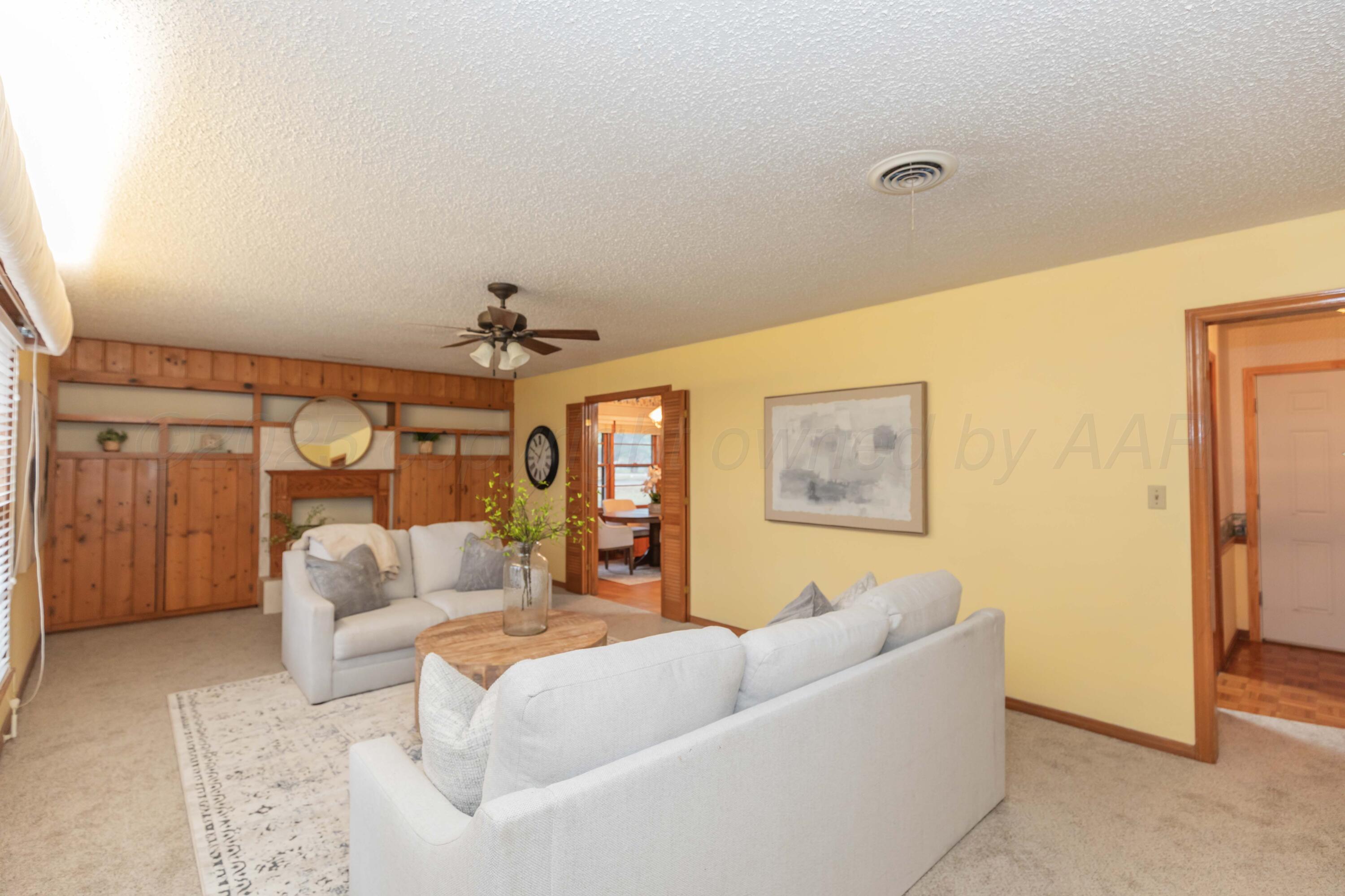 4221 Arden Road Amarillo, TX 79110 - Photo 8 of 50 a living room with furniture and a window
