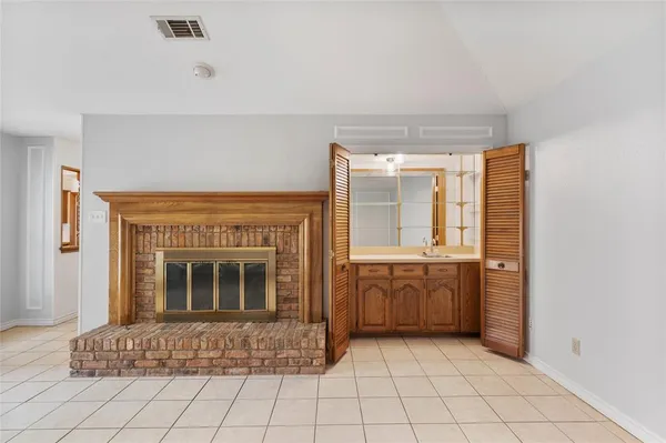 a large windows in a hall with an empty room