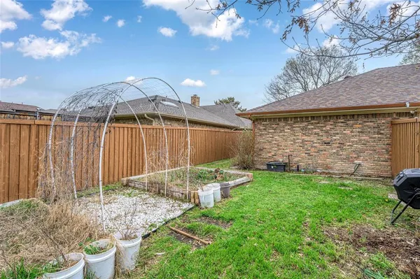 a backyard view of a house