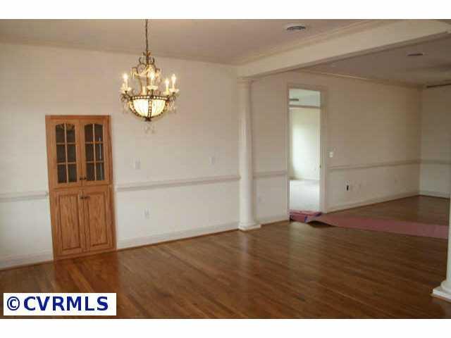Other - Dining room with tray ceiling and built in cabinet