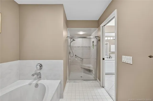 a view of a backyard with potted plants and plants