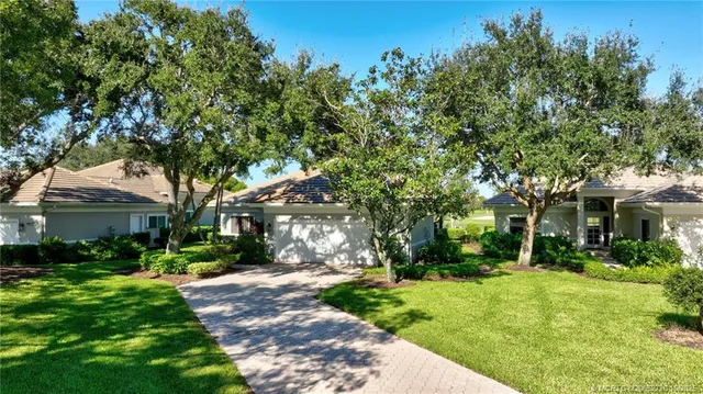 a view of a swimming pool with a garden