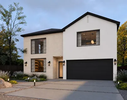 a front view of a house with garage