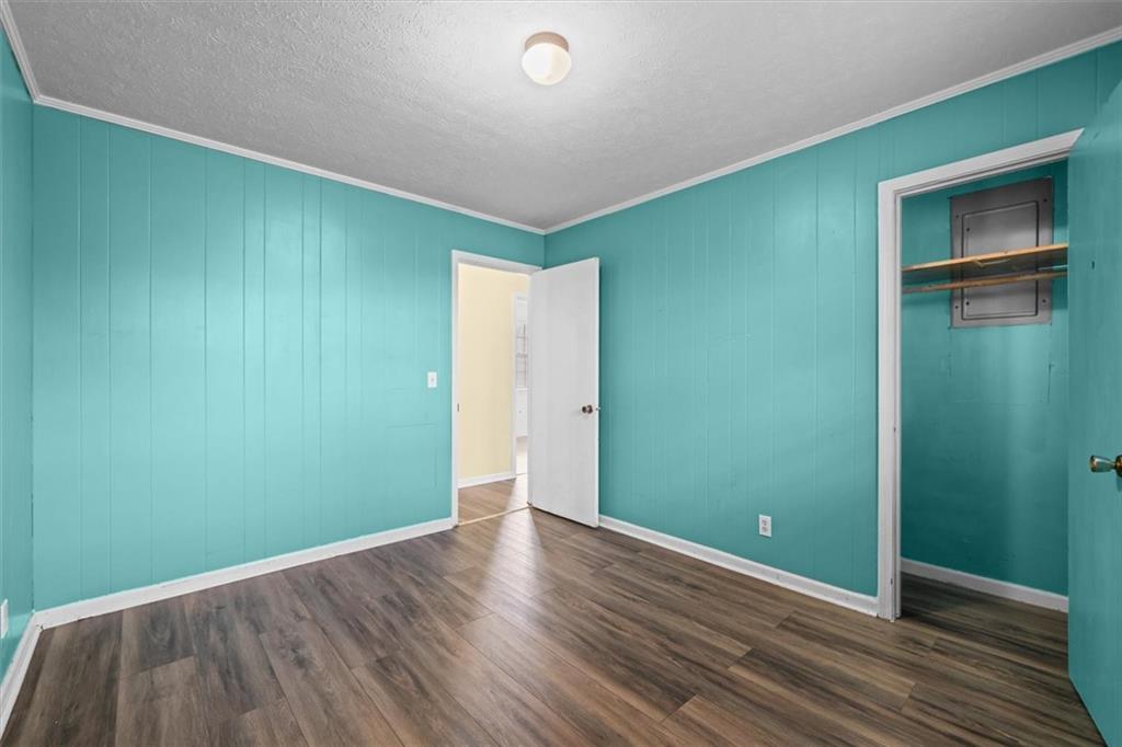 133 2nd Street Calhoun, GA 30701 - Photo 21 of 33 a view of an empty room with wooden floor