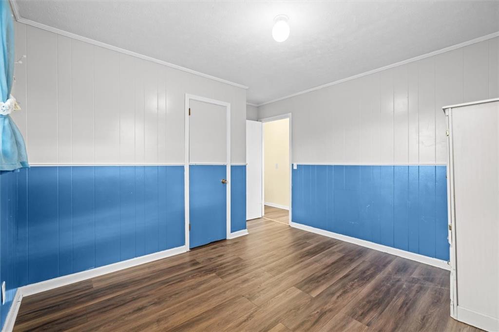 133 2nd Street Calhoun, GA 30701 - Photo 23 of 33 a view of empty room with wooden floor