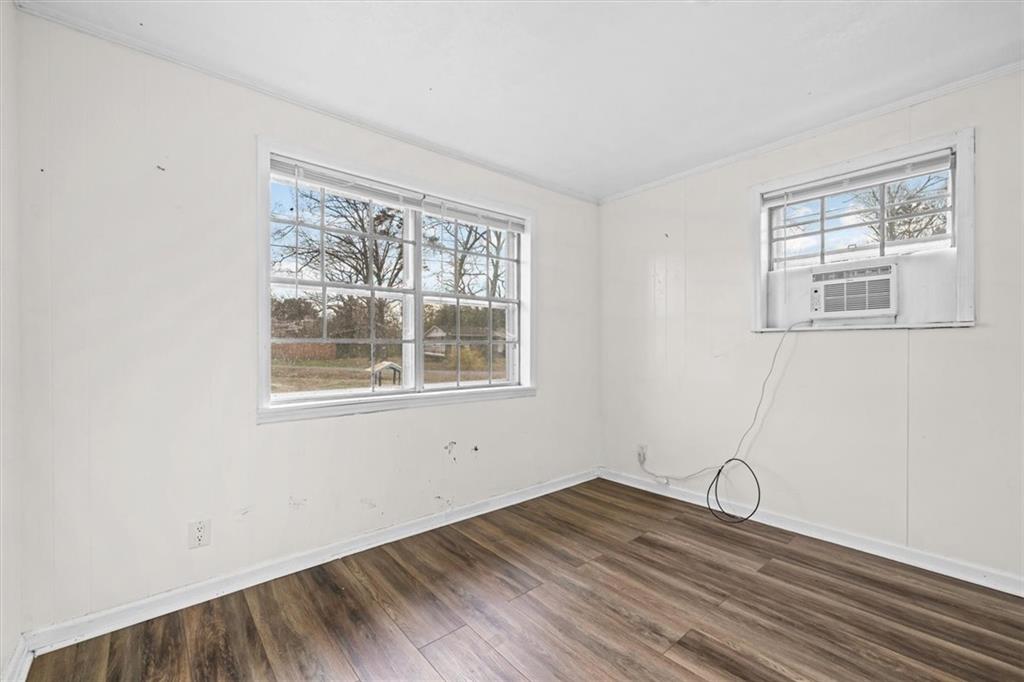 133 2nd Street Calhoun, GA 30701 - Photo 24 of 33 a view of a room with wooden floor and windows