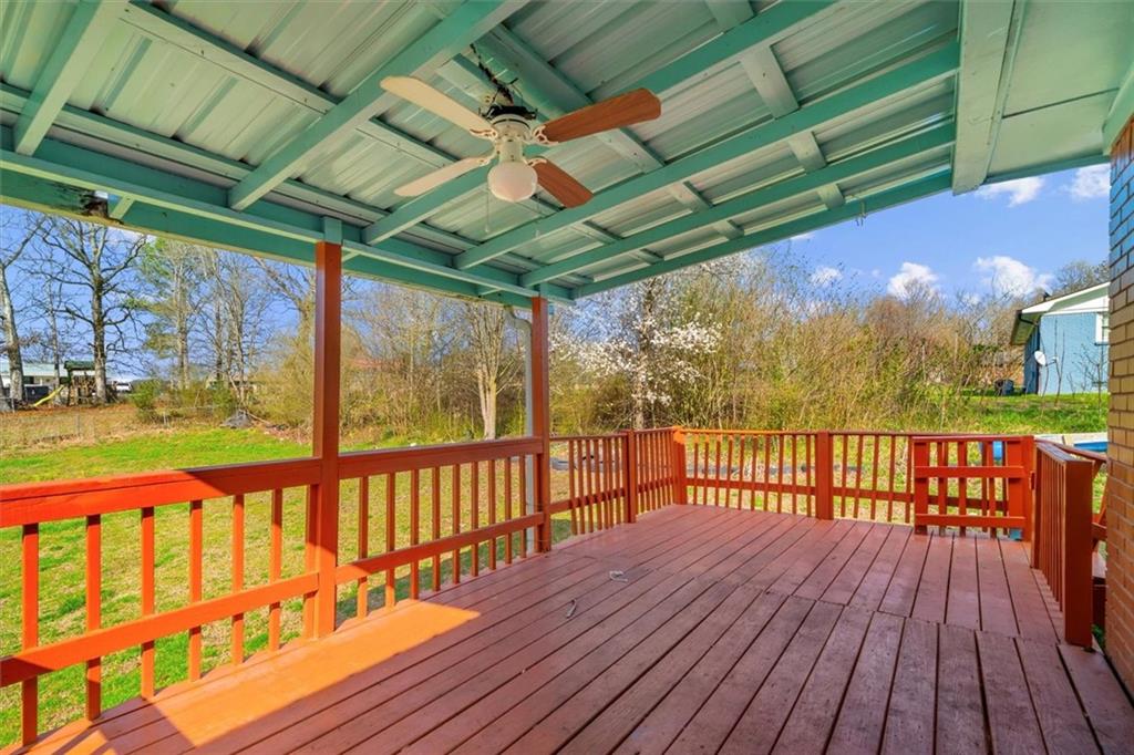 133 2nd Street Calhoun, GA 30701 - Photo 29 of 33 a view of porch with wooden floor