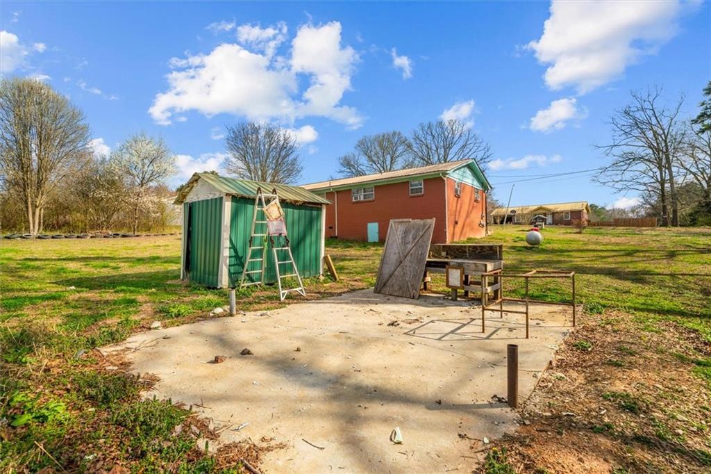133 2nd Street Calhoun, GA 30701 - Photo 32 of 33 a view of a backyard