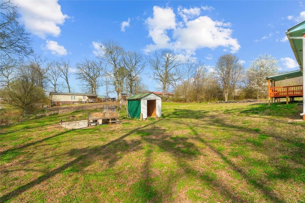 133 2nd Street Calhoun, GA 30701 - Photo 33 of 33 a bathroom with a sink and a yard