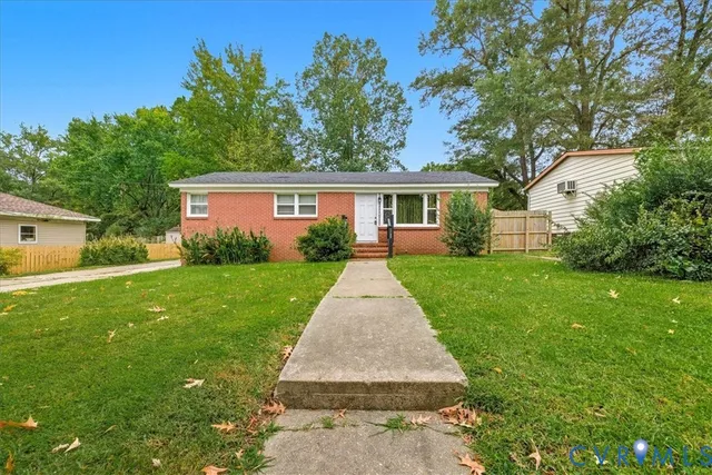 front view of a house and a yard